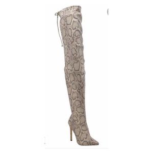 Thigh high snake skin boot